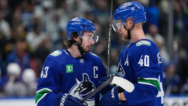 Quinn Hughes Elias Pettersson