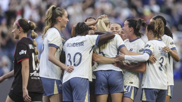 Seattle Reign celebrate, The Canadian Press Seattle Reign celebrate