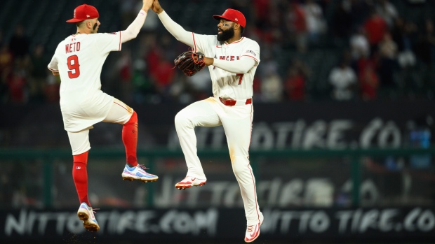 Jo Adell, Zach Neto, The Canadian Press Jo Adell, Zach Neto