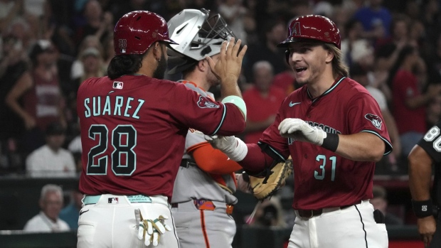 Eugenio Suarez and Jake McCarthy (31)