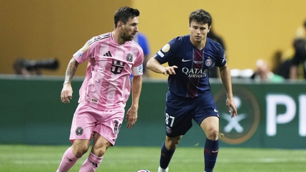 Lionel Messi (left), The Canadian Press Lionel Messi (left)