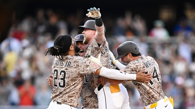 San Diego Padres celebrate Jake Cronenworth's walk-off single, The Canadian Press San Diego Padres celebrate Jake Cronenworth's walk-off single
