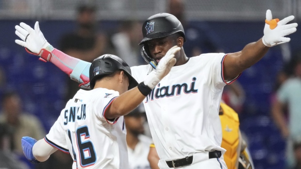 Miami Marlins celebrate, The Canadian Press Miami Marlins celebrate