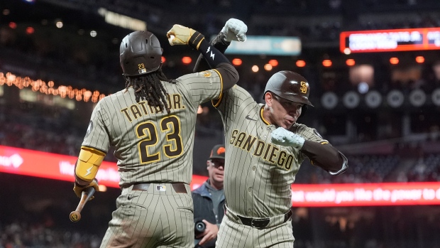 San Diego Padres' Freddy Fermin and Fernando Tatis Jr. , The Canadian Press San Diego Padres' Freddy Fermin and Fernando Tatis Jr.