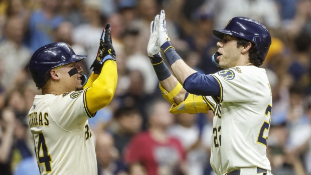 Christian Yelich and William Contreras, The Canadian Press Christian Yelich and William Contreras
