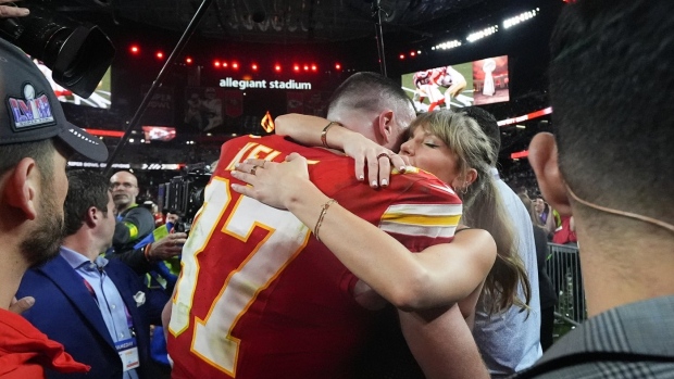 Travis Kelce and Taylor Swift, The Canadian Press Travis Kelce and Taylor Swift