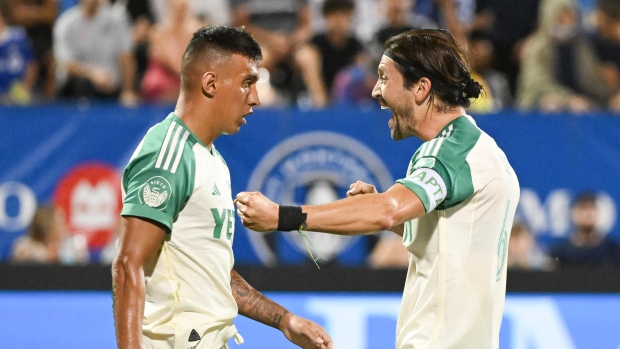 Myrto Uzuni, left, Ilie Sanchez (6)